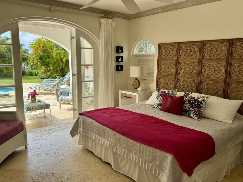 Guest bedroom with outdoor living area and pool access