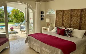Guest bedroom with outdoor living area and pool access