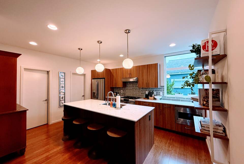 Modern kitchen amenities and half bath