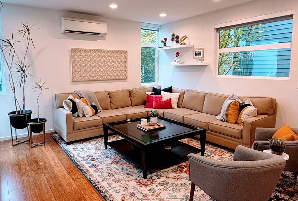 Host everyone - large sectional couch in living room
