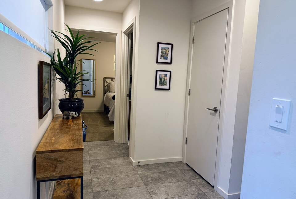 Ground floor entry; features two bedrooms with shared bathroom