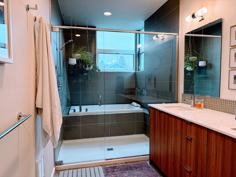 Primary bath with wet room and water closet