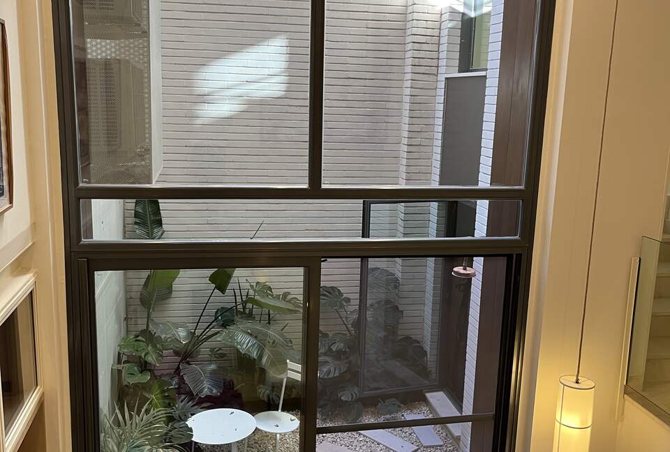 Contemporary Apartment Framed by Lush Gardens - El Puerto de Santa María, Spain