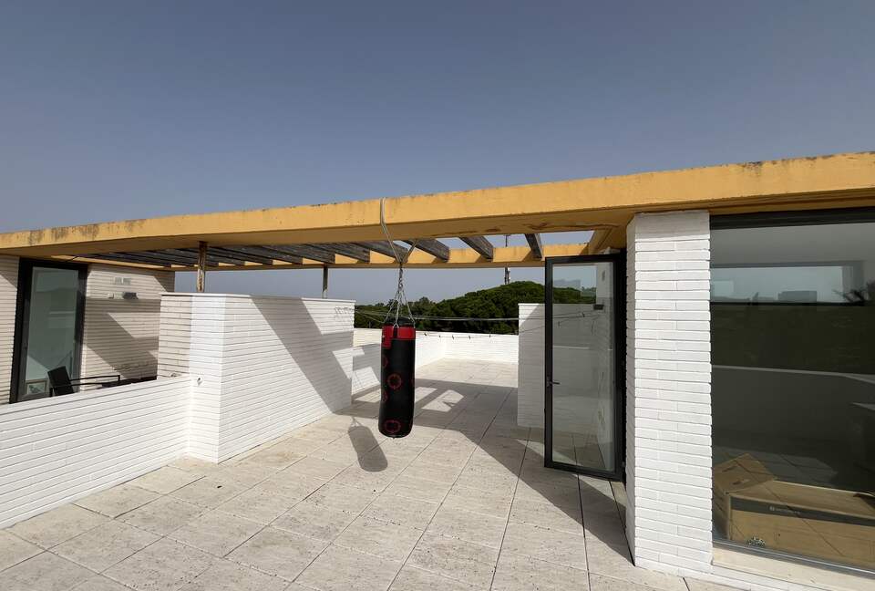 Contemporary Apartment Framed by Lush Gardens - El Puerto de Santa María, Spain