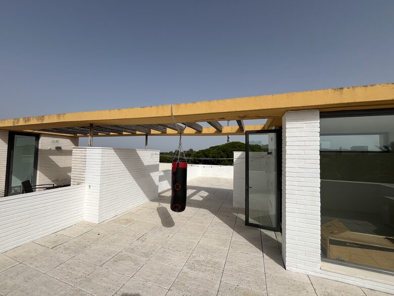 Contemporary Apartment Framed by Lush Gardens - El Puerto de Santa María, Spain