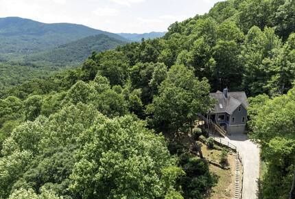 Steep driveway has room to turn around at top