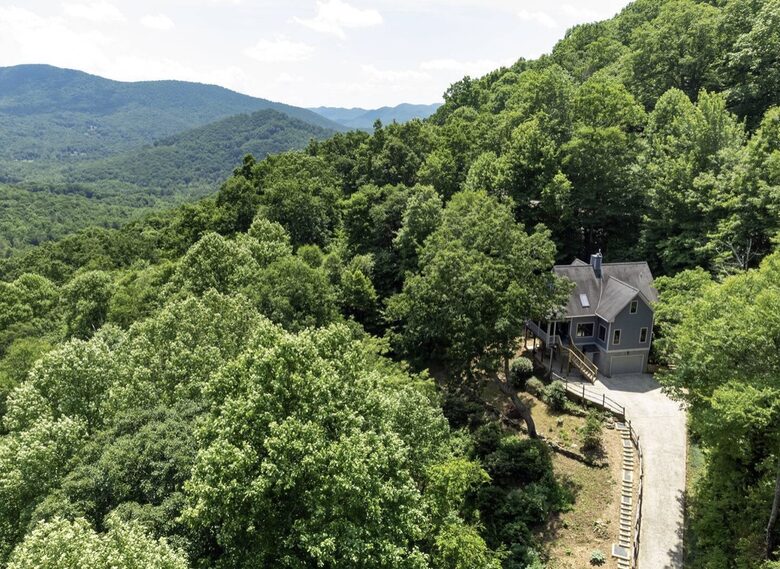 Steep driveway has room to turn around at top