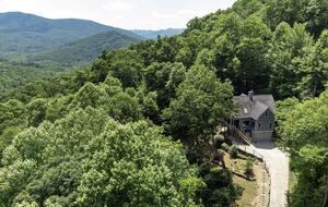 Steep driveway has room to turn around at top
