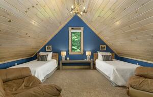 Loft bedroom on top floor