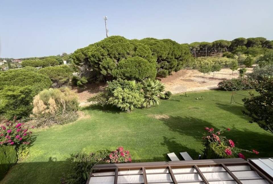Contemporary Apartment Framed by Lush Gardens - El Puerto de Santa María, Spain