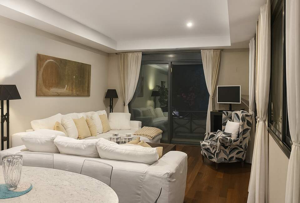 Contemporary Apartment Framed by Lush Gardens - El Puerto de Santa María, Spain