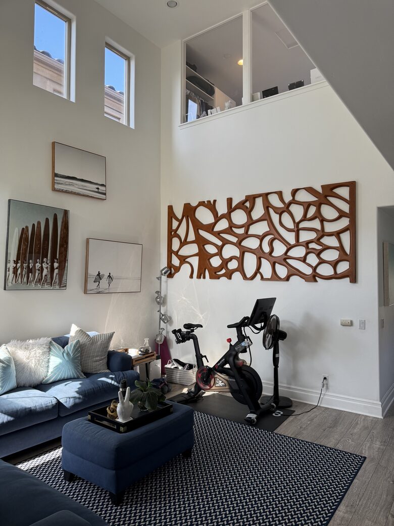 Second floor living area with TV and Peloton