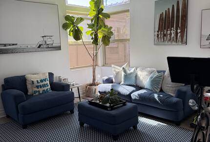 Second Floor Living Area with TV and Fireplace