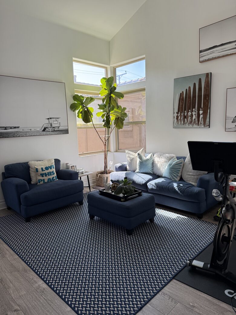 Second Floor Living Area with TV and Fireplace